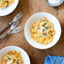 <p>This gluten-free butternut squash mac and cheese packs plenty of cheesy goodness in every bite. Chickpea pasta gets coated in a sauce made with pureed butternut squash that gives this comforting meal a nutrient boost and adds a sweet note to complement the savory flavors. <a href="https://www.eatingwell.com/recipe/7871607/butternut-squash-chickpea-mac-cheese/" rel="nofollow noopener" target="_blank" data-ylk="slk:View Recipe" class="link ">View Recipe</a></p>
