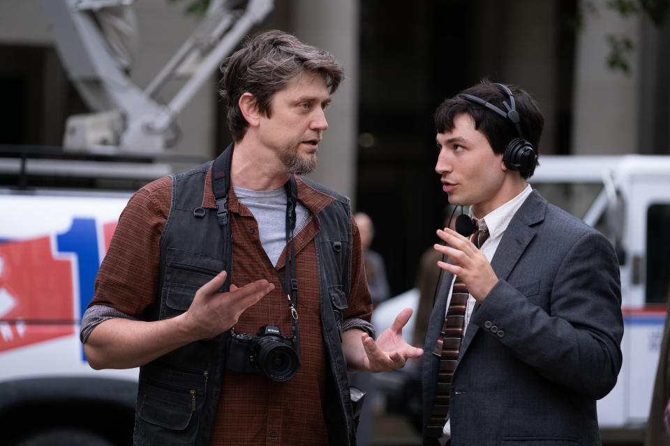 Director ANDY MUSCHIETTI and EZRA MILLER and on the set of 
 The Flash. (Warner Bros.)