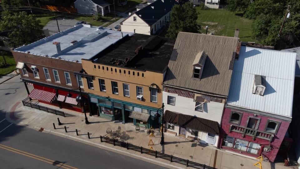 This drone photo shows historic storefronts on the north side of West Main Street, between 10th Street and 11th Street. St. Clair County plans to demolish the tan-sided one, second from right, which was built in the 1860s.