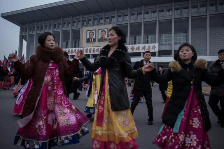 Performers take part in a mass dance event on the occasion of the 75th anniversary of the birth of Kim Jong-Il, in Pyongyang on February 16, 2017