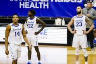 Seton Hall's Sandro Mamukelashvili (23), Myles Cale (22) and Jared Rhoden (14) react during the second half of an NCAA college basketball game against the Creighton Wednesday, Jan. 27, 2021, in Newark, N.J. Creighton won 85-81. (AP Photo/Frank Franklin II)