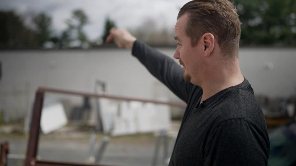 Stafford is seen gesturing to a roof, which will be used for a sequence of shots to pull off a scene that depicts one of the characters jumping from the top of a tall building. 