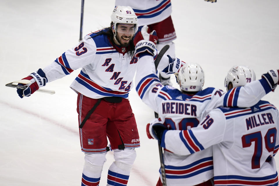 New York Rangers' Chris Kreider (20) celebrates his goal during the third period in Game 6 of an NHL hockey Stanley Cup first-round playoff series against the Pittsburgh Penguins in Pittsburgh, Friday, May 13, 2022. (AP Photo/Gene J. Puskar)