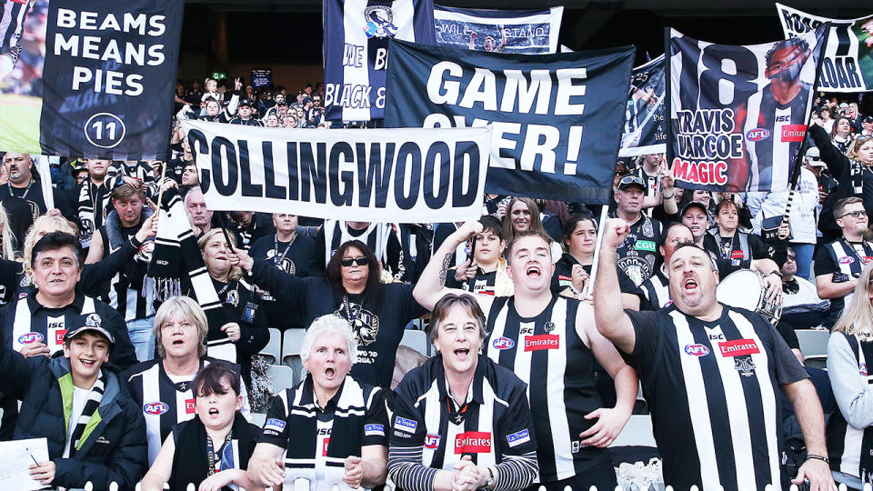Magpies fan Simon Grech says police threatened to evict him for "barracking too loud".