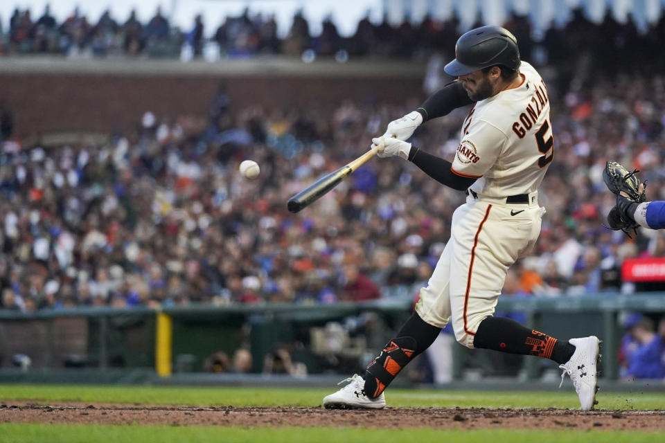 San Francisco Giants' Luis Gonzalez hits a two-run home run against the Chicago Cubs during the fourth inning of a baseball game in San Francisco, Saturday, July 30, 2022. (AP Photo/Godofredo A. Vásquez)