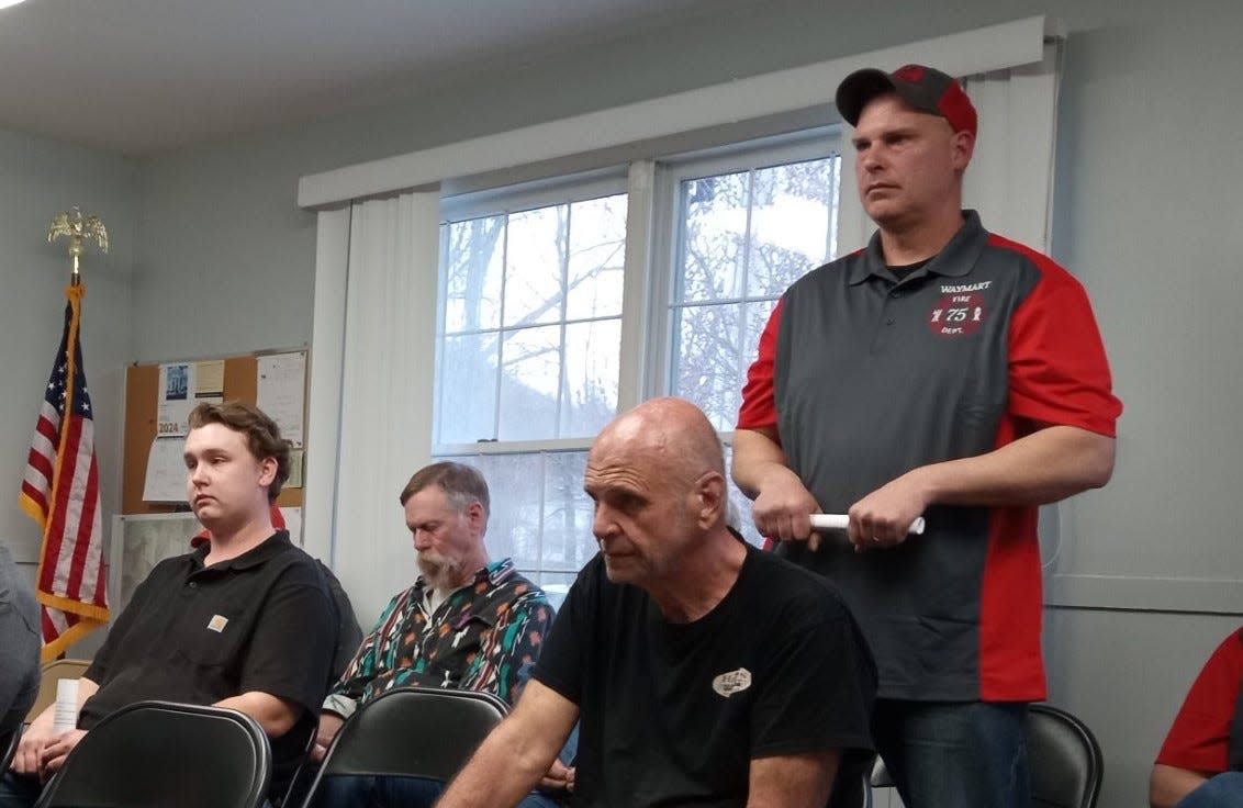 Aaron Geary, an officer with Waymart Fire Company, stands at right on April 9, 2024, and shares with Waymart Borough Council on progress and needs faced by the volunteer department. They have what he described as a record membership of 39 members, but eight of them lack turn-out gear.