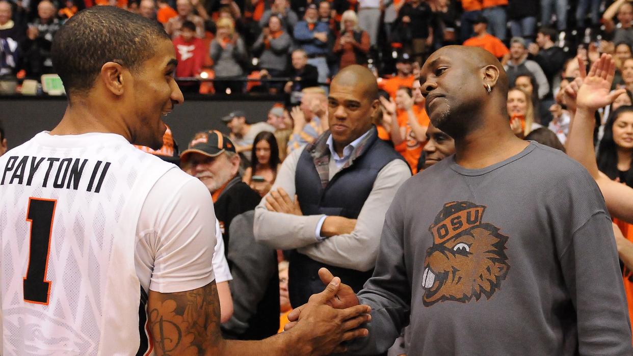 24 February 2016: Former NBA star and Oregon State alumni Gary Payton shakes the hand of his son, Oregon State University senior guard Gary Payton II (1) after the game during a PAC-12 NCAA basketball game between the University of Washington Huskies and Oregon State University Beavers at Gill Coliseum in Corvallis, Oregon. Oregon State won the game 82-81. (Photo by Brian Murphy/Icon Sportswire) (Photo by Brian Murphy/Icon Sportswire/Corbis/Icon Sportswire via Getty Images)