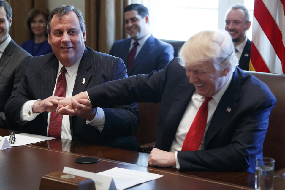 New Jersey Gov. Chris Christie shares a laugh with President Donald Trump during an opioid and drug abuse listening session, Wednesday, March 29, 2017, in the Cabinet Room of the White House in Washington. (AP Photo/Evan Vucci)