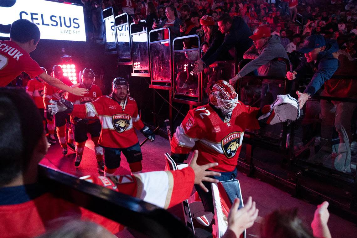 Florida Panthers goaltender Sergei Bobrovsky (72) high fives fans while walking onto the ice before the first period of a hockey game against the Detroit Red Wings on Wednesday, Jan. 17, 2024, at Amerant Bank Arena in Sunrise, Fla. Alie Skowronski/askowronski@miamiherald.com