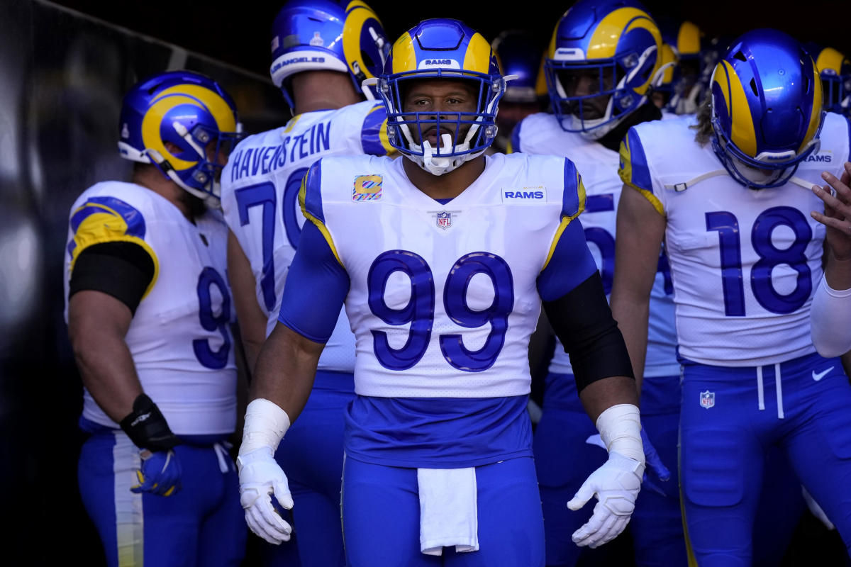 Los Angeles Rams defensive end A'Shawn Robinson uses smelling salts before  the NFL Super Bowl 56 football game against the Cincinnati Bengals, Sunday,  Feb. 13, 2022, in Inglewood, Calif. (AP Photo/Mark J.