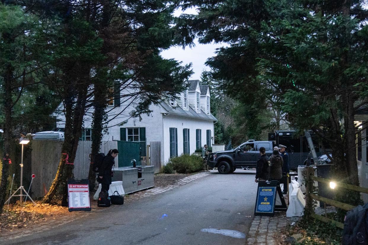 The access road to President Joe Biden's home in Wilmington, Del., is seen from the media van on Jan. 13, 2023. The Justice Department has searched Biden’s home in Delaware and located six documents containing classification markings and also took possession of some of his notes, the president’s lawyer said Saturday, Jan. 21.