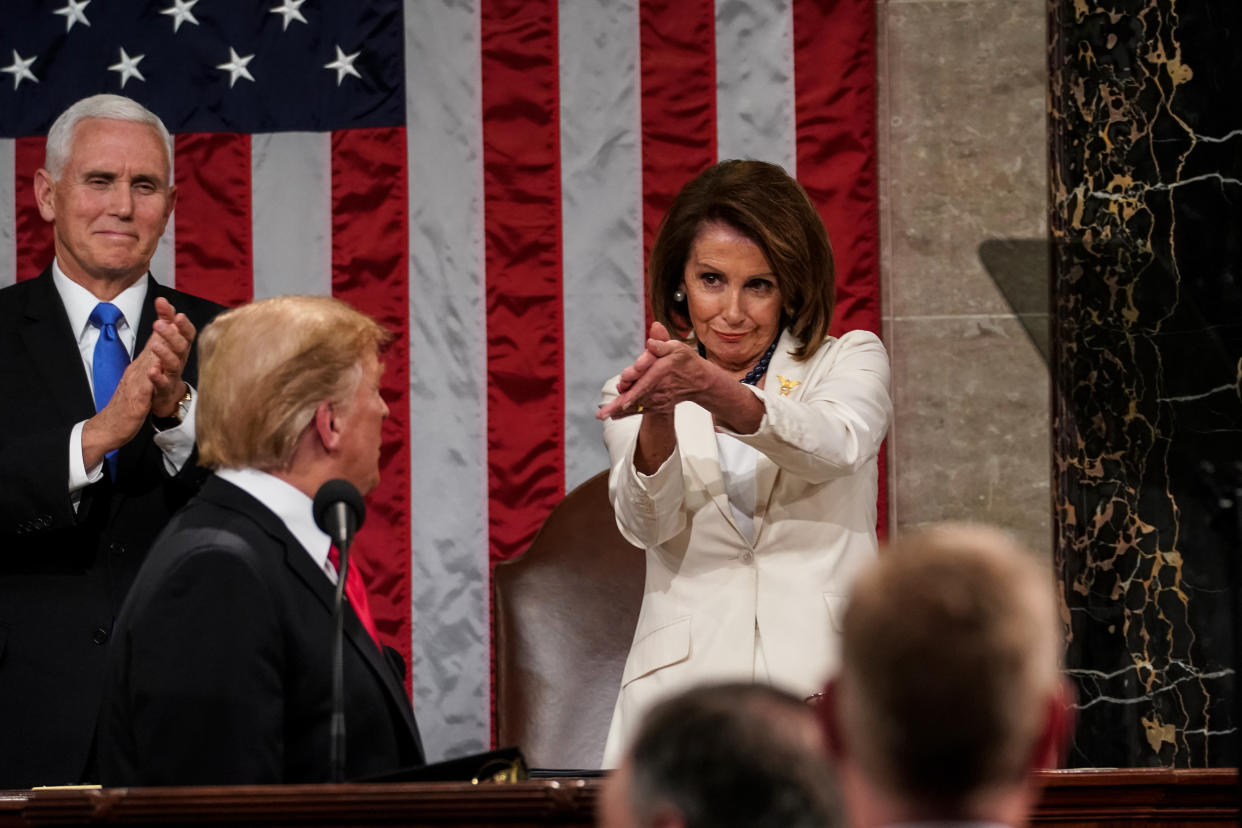 House Speaker Nancy Pelosi, pictured with Vice-President Mike Pence and President Donald Trump, told talk show host Bill Maher that Trump is "impeached forever." (Photo: Getty Images)