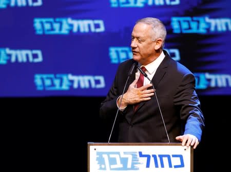 Blue and White party leader Benny Gantz speaks at the party's headquarters following the announcement of exit polls during Israel's parliamentary election in Tel Aviv