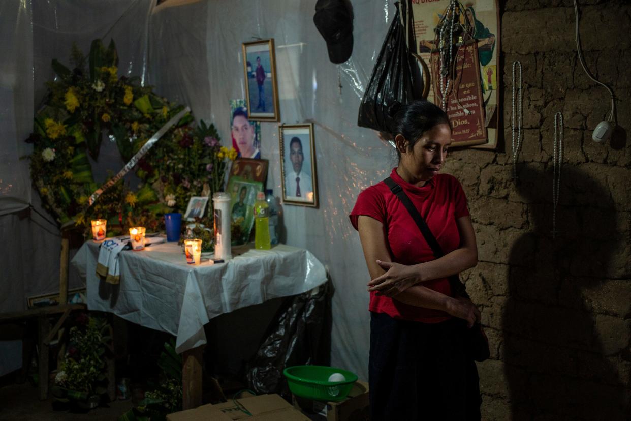 Ingrid Tomás at home in Comitancillo, Guatemala, at her brother’s altar.