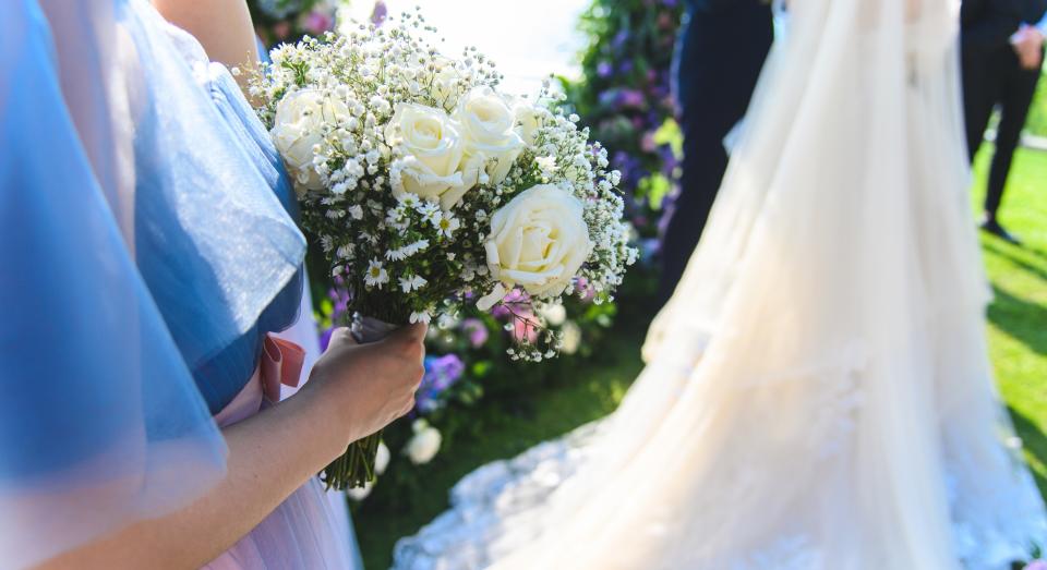 A mum has revealed she's thinking of skipping her sister's pricey nuptials [Image: Getty]