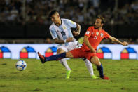 Football Soccer - Argentina v Chile - World Cup 2018 Qualifiers - Antonio Liberti Stadium, Buenos Aires, Argentina - 23/3/17 - Argentina's Marcos Rojo (L) and Chile's Jose Pedro Fuenzalida compete for the ball. REUTERS/Alberto Raggio