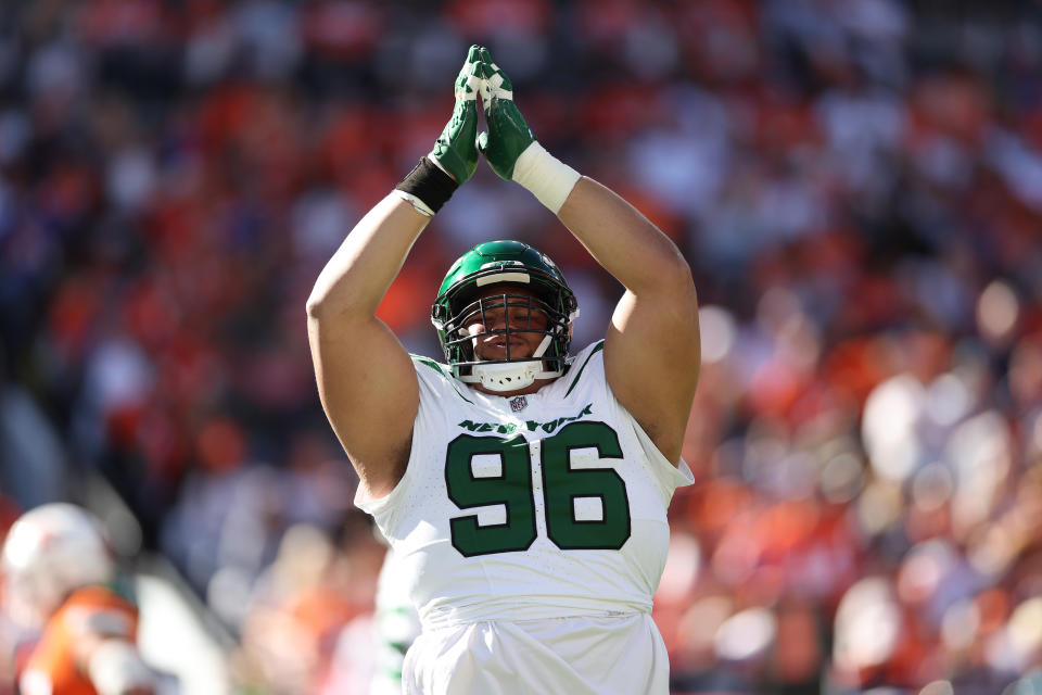 DENVER, COLORADO – OCTOBER 08: Al Woods #96 of the New York Jets reacts after the Denver Broncos were called for a safety in the first quarter at Empower Field At Mile High on October 08, 2023 in Denver, Colorado. (Photo by Matthew Stockman/Getty Images)