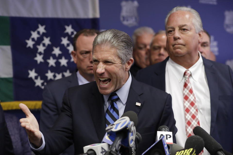 Police Benevolent Associaton President Patrick J. Lynch, left, speaks with NYPD officer Daniel Pantaleo's attorney Stuart London by his side, right, during a press conference at PBA headquarters following a decision to terminate Pantaleo, Monday, Aug. 19, 2019, in New York. Pantaleo was involved in the chokehold death of Eric Garner. (AP Photo/Kathy Willens)