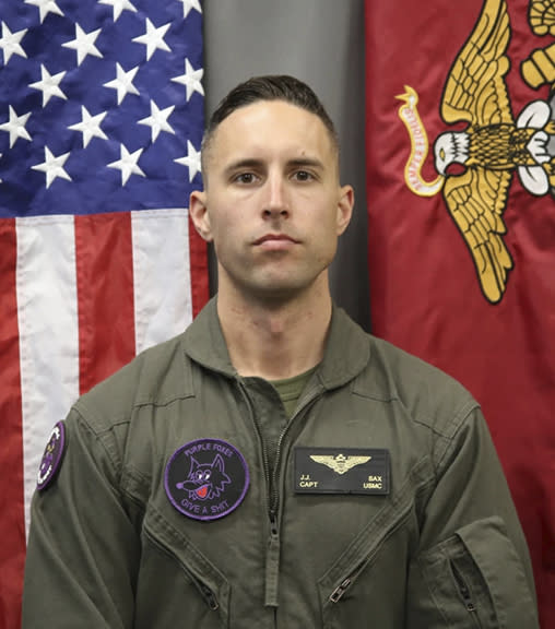 FILE - In this photo provided by U.S. Marine Corps/3rd MAW, U.S. Marine Corps Capt. John J. Sax, 33, of Placer, Calif., who was assigned to Marine Medium Tiltrotor Squadron 364 where he served as an MV-22B pilot, poses for a photo. The deadly crash of a Marine V-22 Osprey in California last year was caused by mechanical failure, according to an investigation that ruled out pilot and maintenance errors. Five Marines died in the crash including Sax. The more than 400-page report released on Friday, July 21, 2023, concluded that the Marines were doing routine flight operations when a “catastrophic, unpreventable and unanticipated mechanical failure occurred.” (U.S. Marine Corps/3rd MAW via AP, File)