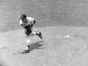 FILE - Chicago White Sox pitcher Ray Herbert throws Aug. 7, 1962, during a baseball game against the Baltimore Orioles in Chicago, Ill. Herbert's no-hit bid blew up in the seventh and eighth innings when he allowed singles but no runs. Herbert, a 1962 American League All-Star winning pitcher who threw batting practice for his hometown Detroit Tigers for decades after retiring, died peacefully in Plymouth, Mich., on Dec. 20, 2022, five days after his 93rd birthday. (AP Photo/Harry Harris, File)