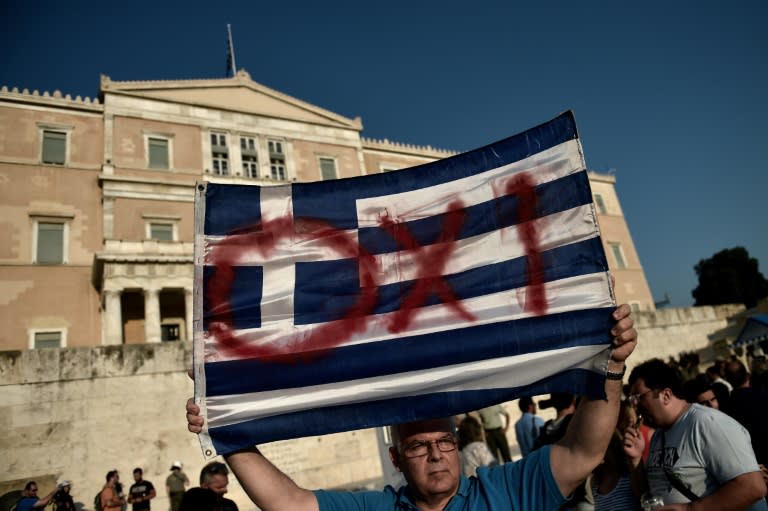 Anti-austerity protesters call for a 'No' vote in the forthcoming referendum as they demonstrate outside the Greek parliament in Athens, on June 29, 2015