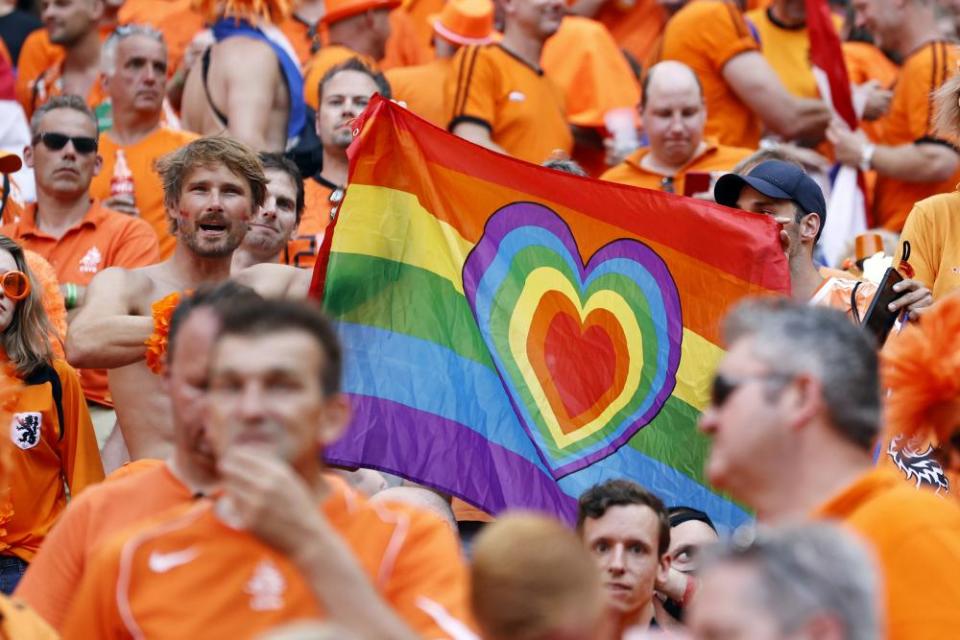 Netherlands fans hold the rainbow flag during Euro 2020. Will the flag be on show in Qatar?