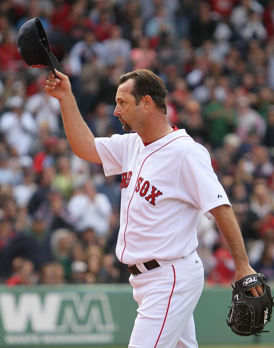 BOSTON - APRIL 25: Tim Wakefield #49 of the Boston Red Sox tips his cap tot he crowd during the game against the Baltimore Orioles at Fenway Park on April 25, 2010 in Boston, Massachusetts.  (Photo by Jim Rogash/Getty Images)