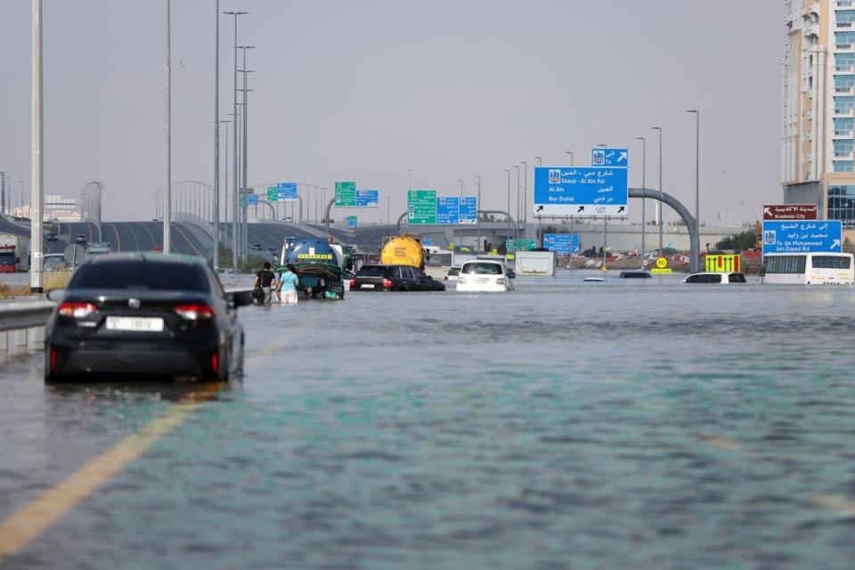 Thousands of UK travellers are struggling to get home after Dubai International Airport was flooded by an intense storm (EPA)