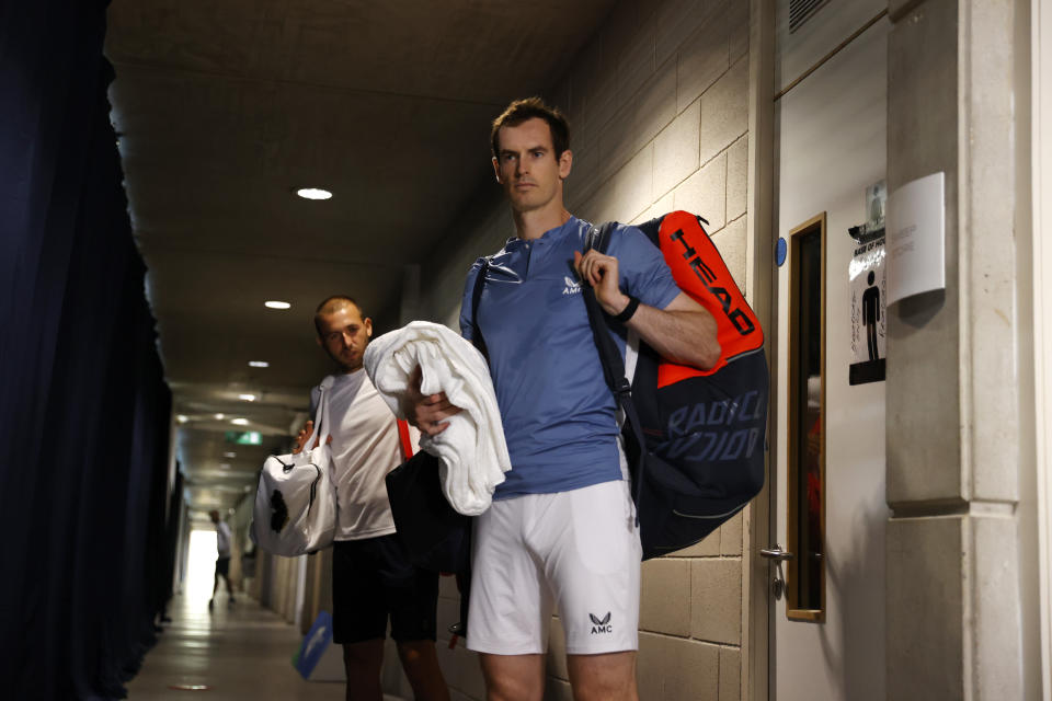 Andy Murray prepares to enter the court ahead of his singles semi final match.