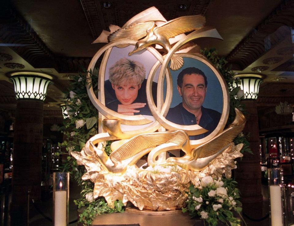 PHOTO: An eight-foot high bronze sculpture in the window of Harrods department store in Knightsbridge, London, on the first anniversary of the death of Diana, Princess of Wales, and Dodi Fayed, son of Harrods former owner Mohamed Al Fayed, Aug. 31, 1998. (Michael Stephens/PA Images via Getty Images, FILE)