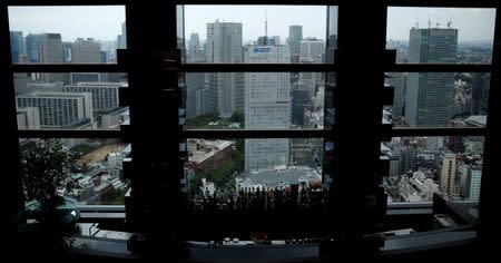 High rise office buildings are seen behind a hotel bar in Tokyo, Japan July 19, 2016. REUTERS/Toru Hanai