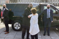 U.S. Defense Secretary Lloyd Austin is greeted by German Defense Minister Annegret Kano-Karrenbauer, Tuesday, April 13, 2021, in Berlin. (AP Photos/Robert Burns)