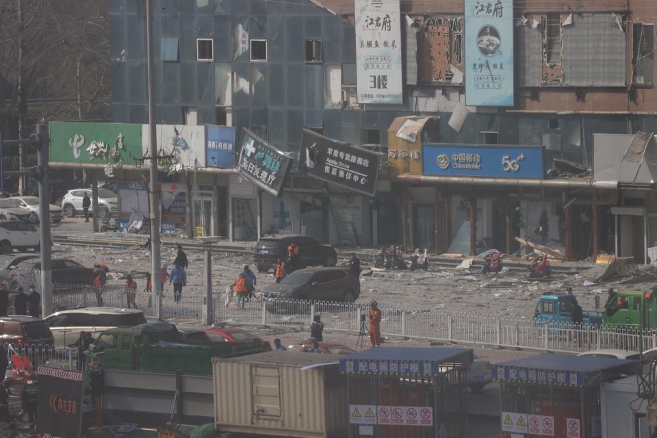 Nearby storefronts in Yanjiao were damaged by the blast on Wednesday.