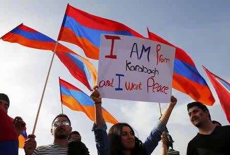 People take part in a rally for peace in Nagorno-Karabakh, in Vienna, Austria, April 5, 2016. REUTERS/Leonhard Foeger