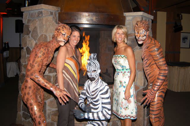 <p>Patrick McMullen</p> Performers painted as animals entertain guests, including Christina Grdovic at the Publisher's Party atop Aspen Mountain.