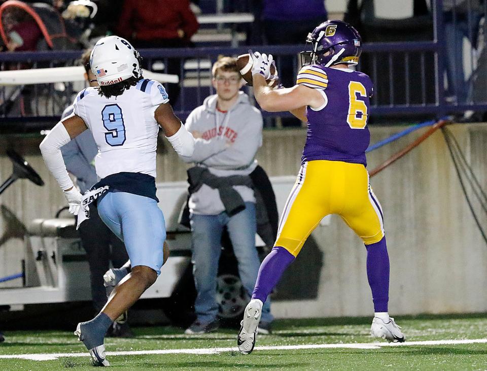 Ashland University's Garrett Turnbaugh (6) catches a pass as Northwood University's Jace Parrish (9) covers during college football action at Jack Miller Stadium Saturday, Oct. 1, 2022. TOM E. PUSKAR/ASHLAND TIMES-GAZETTE