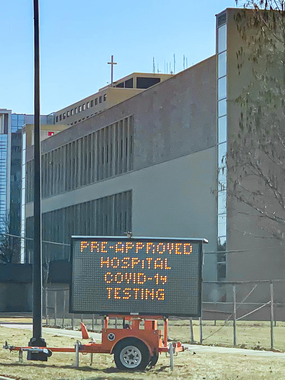 External and outside of emergency room views of the pandemic, novel Coronavirus, or COVID-19 are seen at Advocate Lutheran General Hospital on March 17, 2020 in Park Ridge, Illinois, United States. The collection includes additional tents, a warning construction sign, an empty road, a congested road, a law enforcement vehicle, and a drive through testing area. (Photo by Patrick Gorski/NurPhoto via Getty Images)