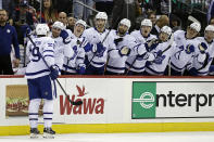 Toronto Maple Leafs right wing Pontus Holmberg (29) is congratulated by teammates after scoring a goal against the New Jersey Devils during the first period of an NHL hockey game Wednesday, Nov. 23, 2022, in Newark, N.J. The Maple Leafs won 2-1. (AP Photo/Adam Hunger)