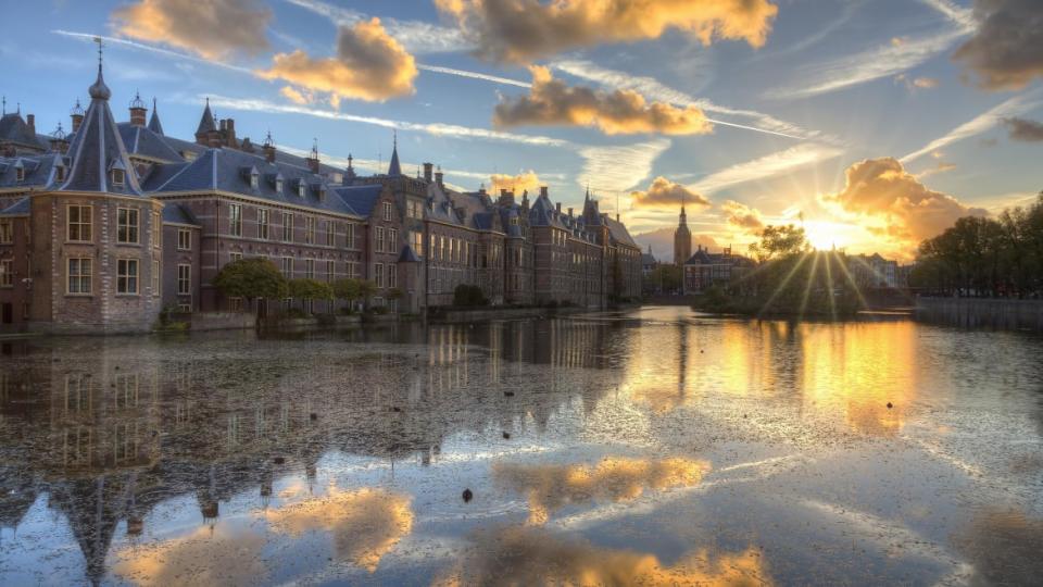 <div class="inline-image__caption"><p>Dutch Houses of Parliament with on the far left 'Het Torentje' (The Little Tower, office of the Dutch Prime Minister) reflected in the Court Pond (Hofvijver).</p></div> <div class="inline-image__credit">Rob Kints/Getty</div>