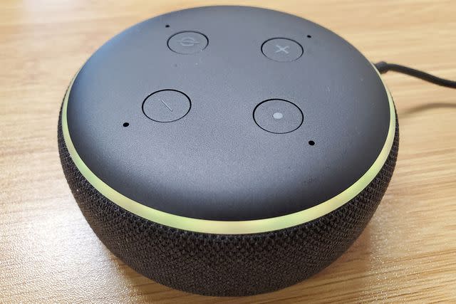 <p>Gado/Getty </p> A photo of an Amazon Echo Dot (3rd Gen.)