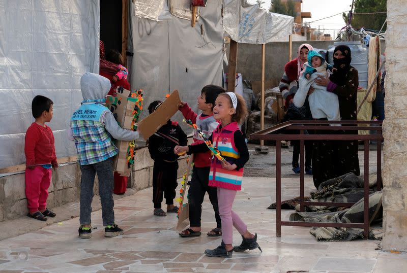 Niños en un asentamiento informal de refugiados en Al-Marj