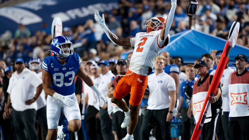 Sam Houston Bearkats defensive back Da’Veawn Armstead (2) almost intercepts a pass intended for BYU Cougars tight end Isaac Rex (83) during the game at LaVell Edwards Stadium in Provo on Saturday, Sept. 2, 2023.