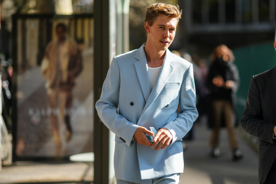 Closeup of Austin Butler walking oustide