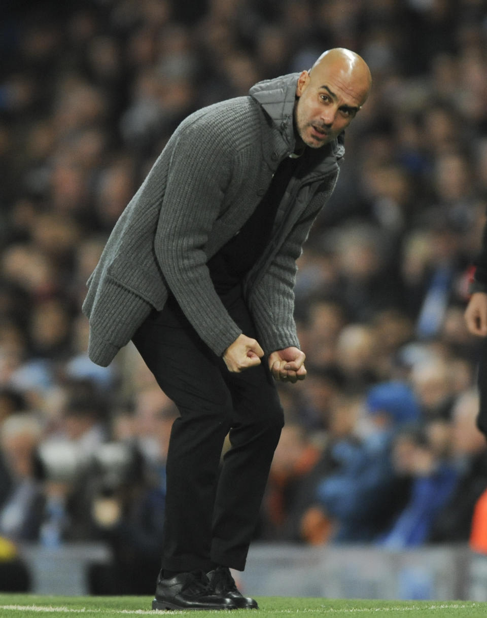 Manchester City coach Pep Guardiola reacts during the Champions League Group F soccer match between Manchester City and Shakhtar Donetsk at Etihad stadium in Manchester, England, Wednesday, Nov. 7, 2018. (AP Photo/Rui Vieira)