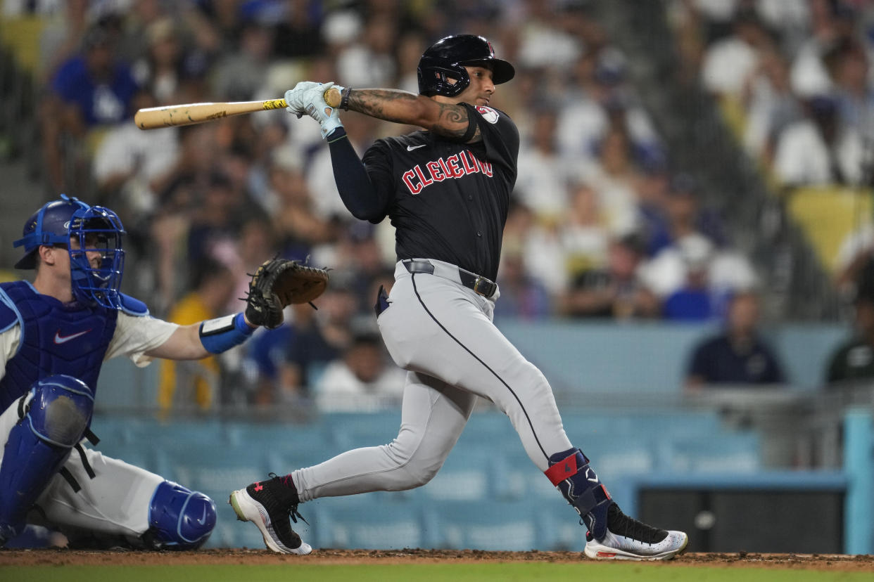 Cleveland Guardians' Brayan Rocchio singles during the sixth inning of a baseball game against the Los Angeles Dodgers in Los Angeles, Friday, Sept. 6, 2024. (AP Photo/Ashley Landis)