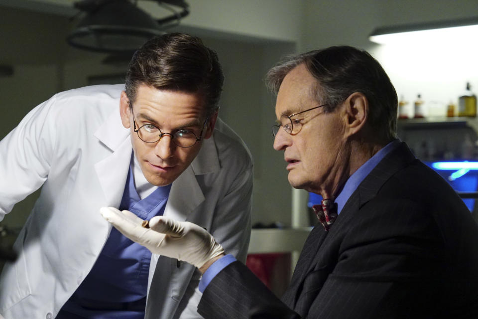 LOS ANGELES - FEBRUARY 6: "One Man's Trash" -  Gibbs and Ducky see an antique war stick on television that could be the missing murder weapon to a 16-year-old cold case, on NCIS, Tuesday, March 13 (8:00-9:00 PM, ET/PT) on the CBS Television Network. Mike Wolfe of "American Pickers"“ guest stars as himself. Pictured: Brian Dietzen, David McCallum. (Photo by Monty Brinton/CBS via Getty Images)