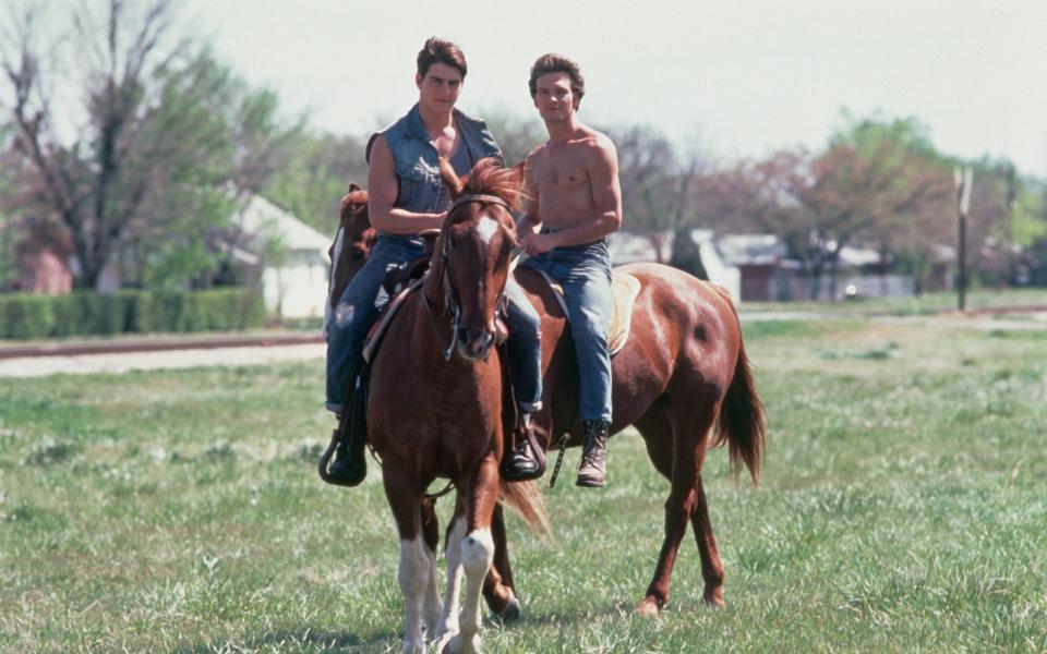 Schöne Männer auf schönen Pferden: Neben Tom Cruise (links) ergatterte unter anderem auch Patrick Swayze (Bild) eine Rolle in "Die Outsider". (Bild: Nancy Moran/Getty Images)