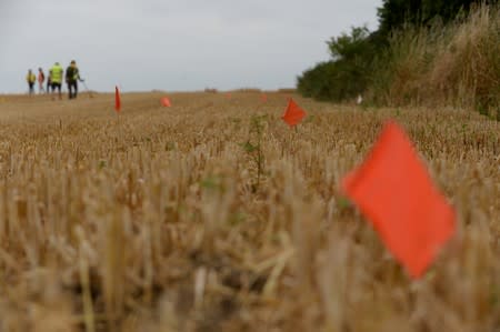 Army veterans and archeologists dig as part of archaeological research campaign called "Waterloo Uncovered" in Waterloo