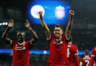 <p>Soccer Football – Champions League Quarter Final Second Leg – Manchester City vs Liverpool – Etihad Stadium, Manchester, Britain – April 10, 2018 Liverpool’s Roberto Firmino celebrates scoring their second goal with Sadio Mane REUTERS/Andrew Yates </p>