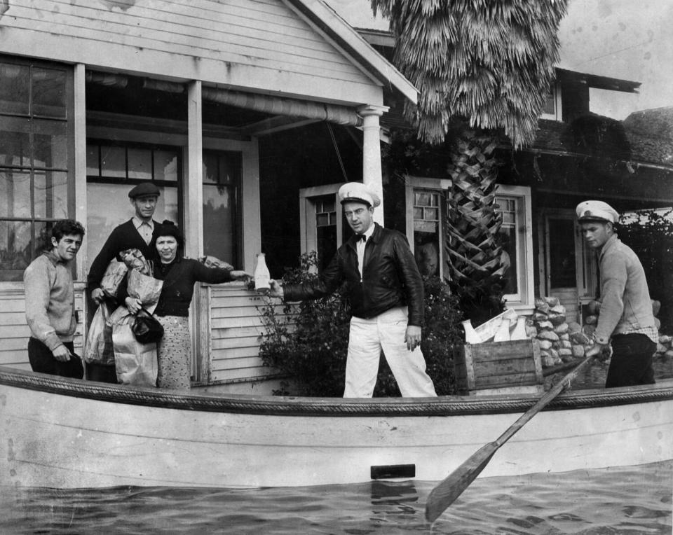 March 3, 1938: Milkman Ray J. Henville secured himself a boat and boatman and made all deliveries on time and on doorstep.